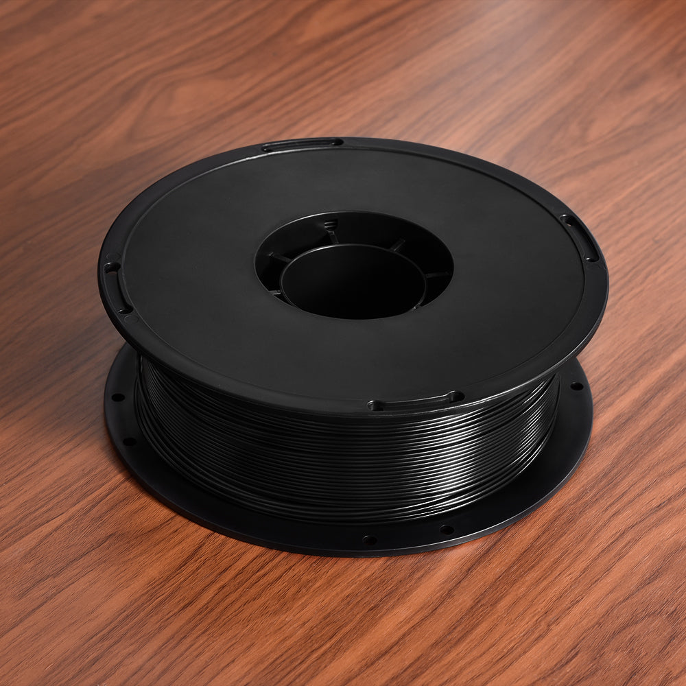 BIQU Panda CF-Wrapped PETG — 1kg Black — on desk