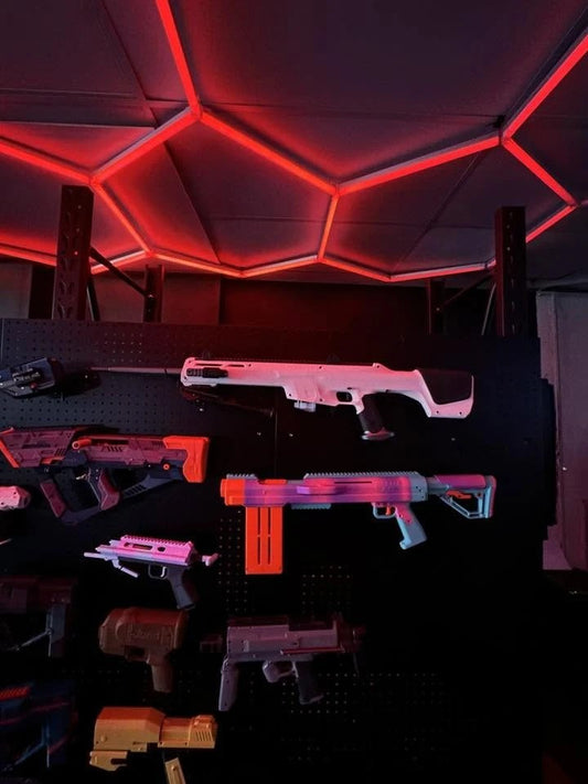Worker Kunlun (purple) and Worker Nightingale V2 Nerf blasters at Siddament