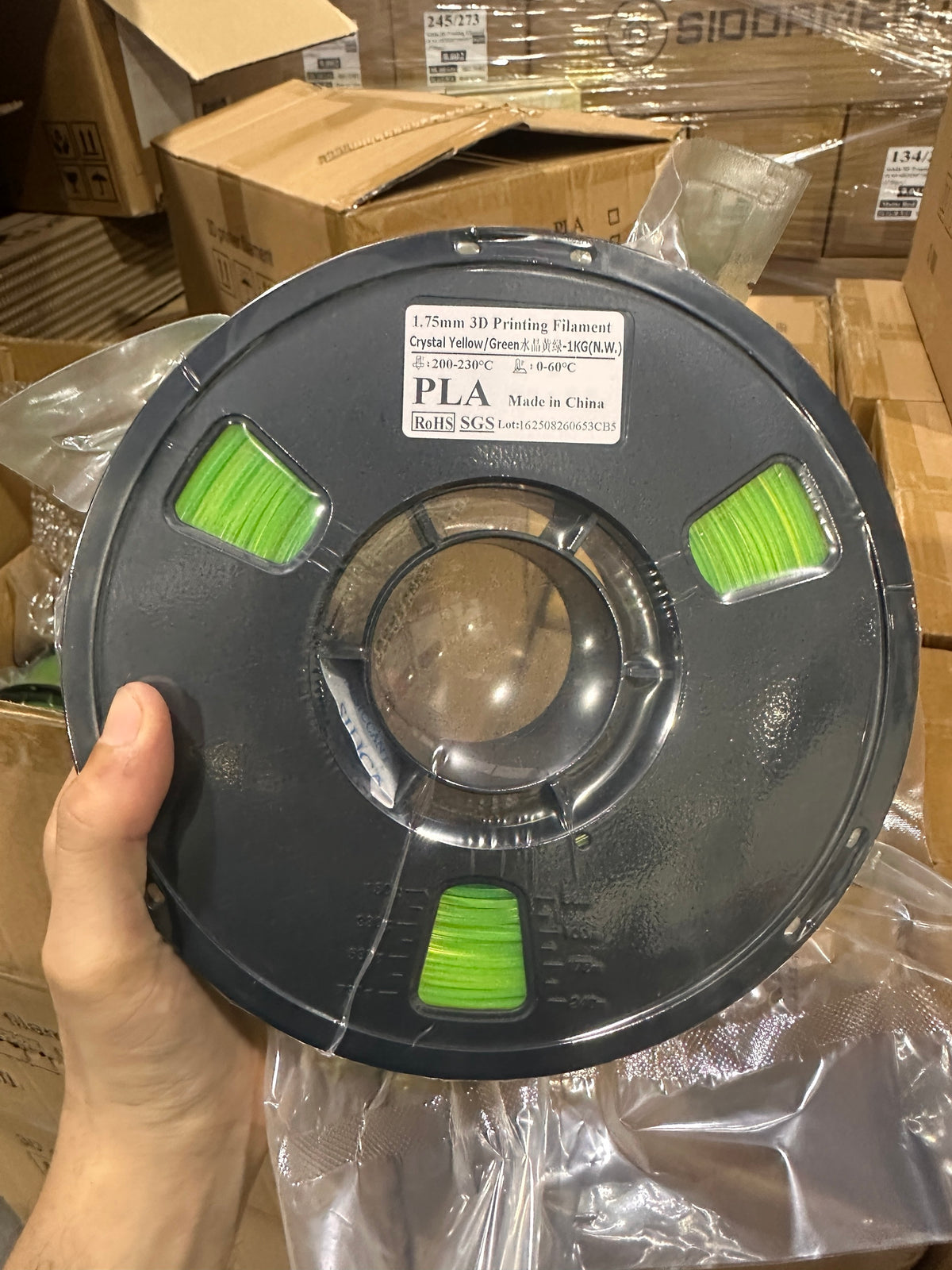 Shittament PLA - real roll from the batch, crystal yellow/green