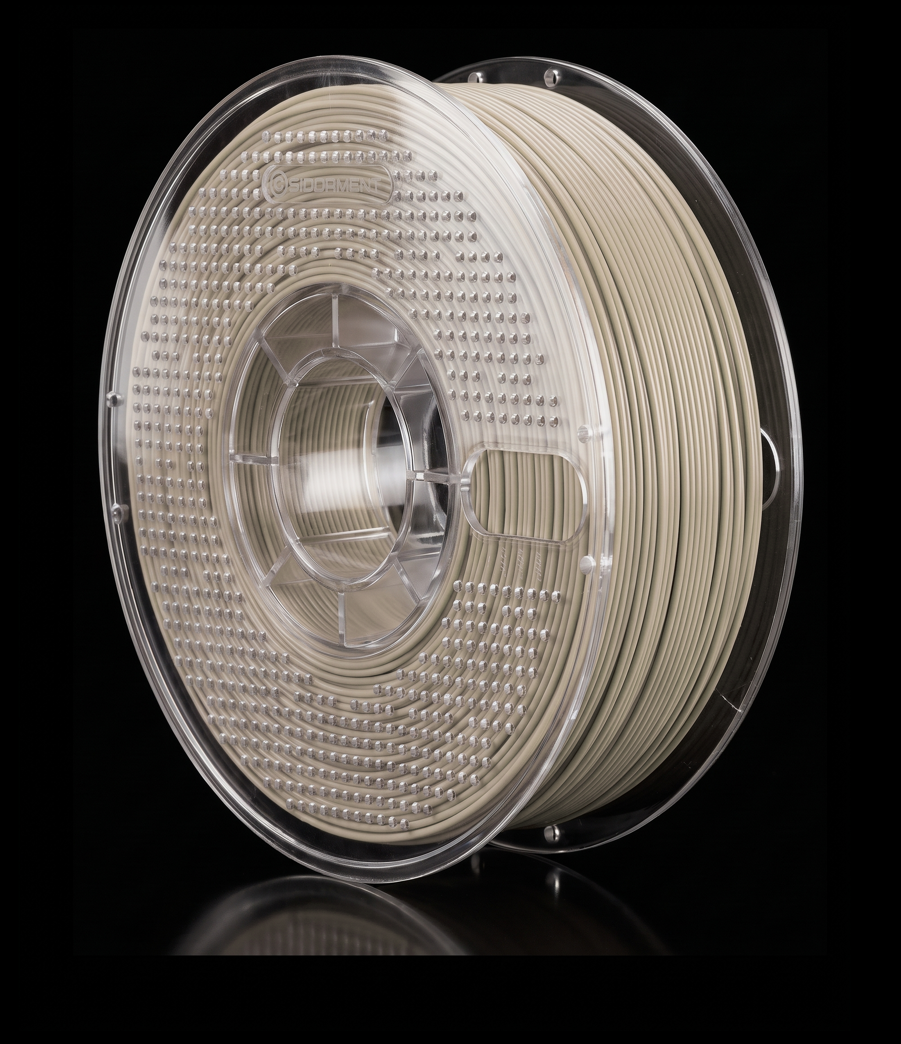 Matte Disc Grey PLA V2 matte PLA filament on a clear SIDDAMENT spool