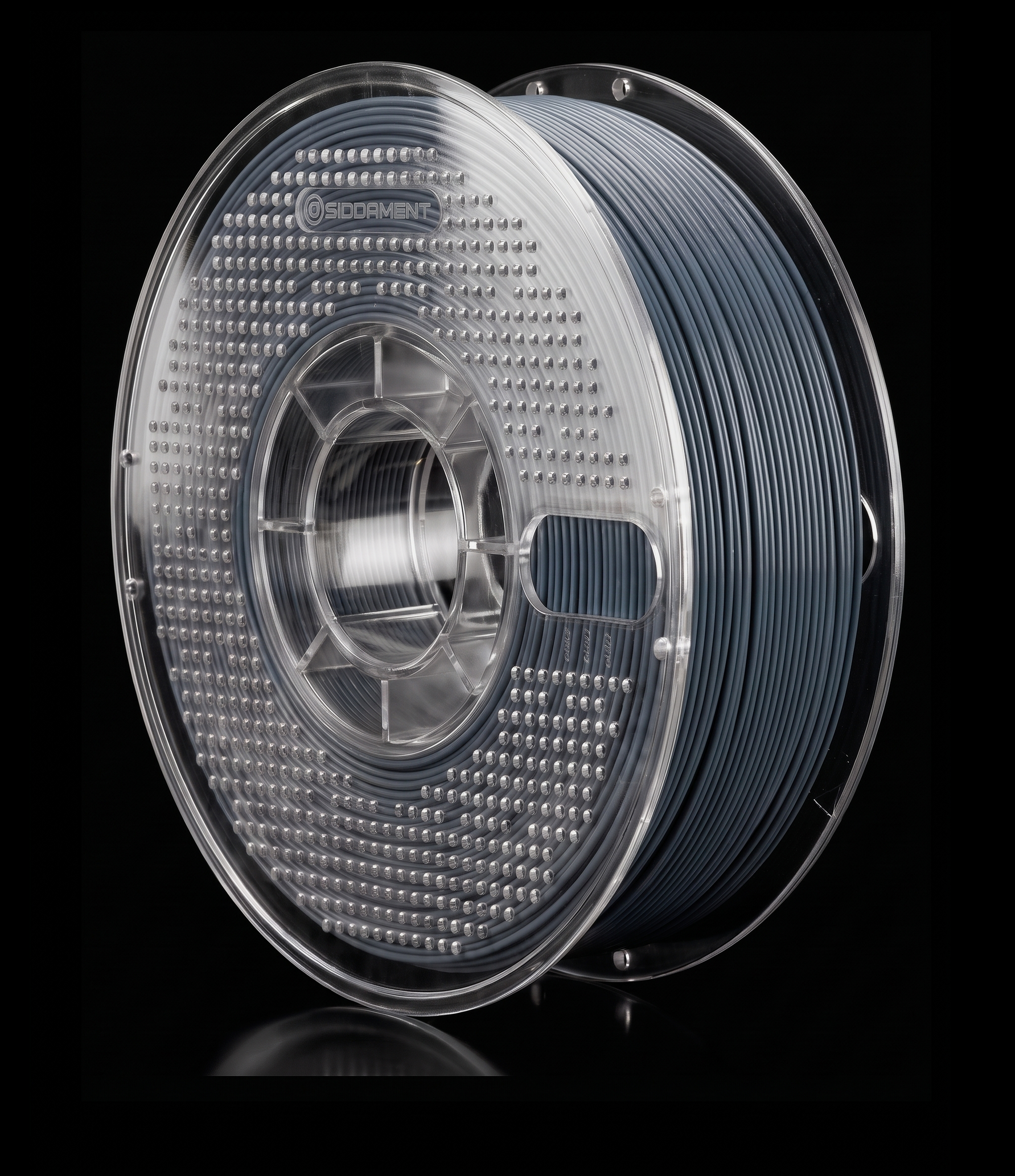 Matte Slate PLA V2 matte PLA filament on a clear SIDDAMENT spool